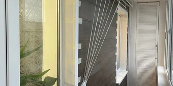 Внутренняя отделка 6м балкона ламинатом, утепление фасада - пеноплексом. Установка шкафа, дверей-жалюзи